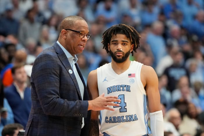 UNC basketball head coach Hubert Davis and guard RJ Davis